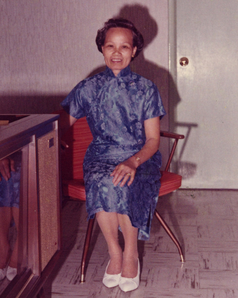 Portrait of Melissa Medvedich great grandmother wearing a blue dress and white shoes